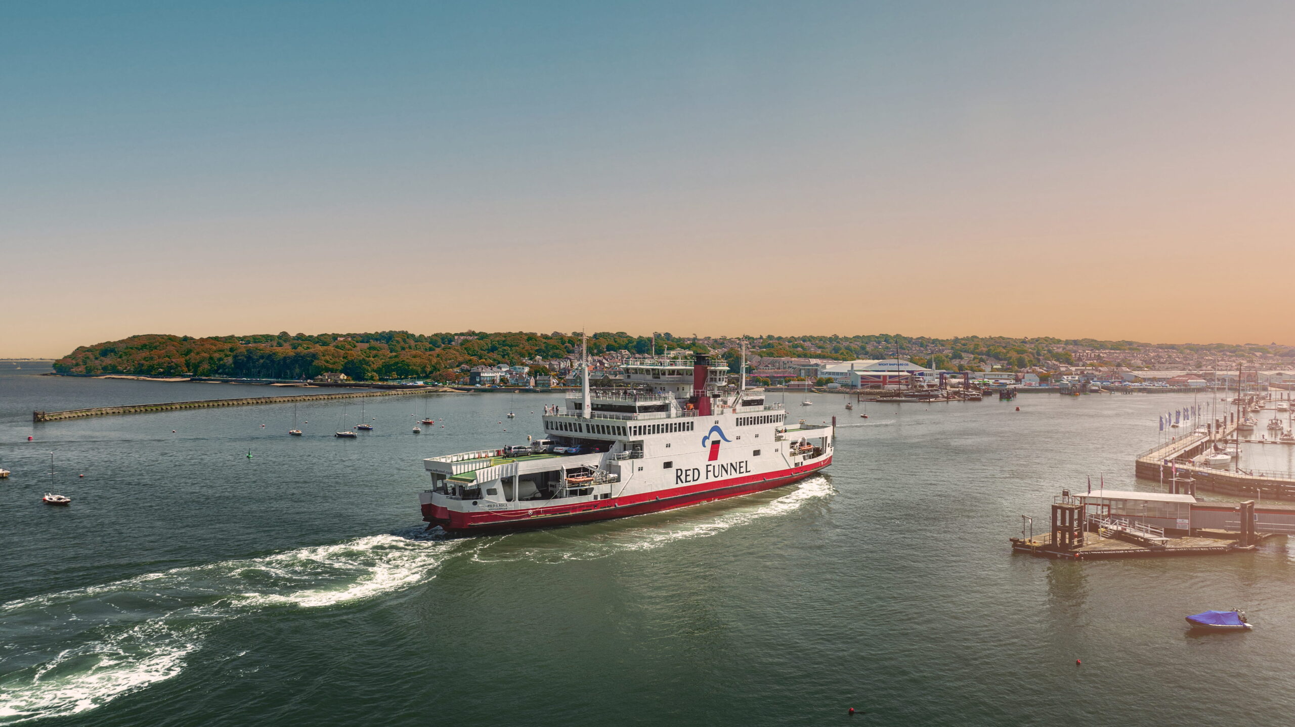 Red funnel ferries at dusk on the isle of wight